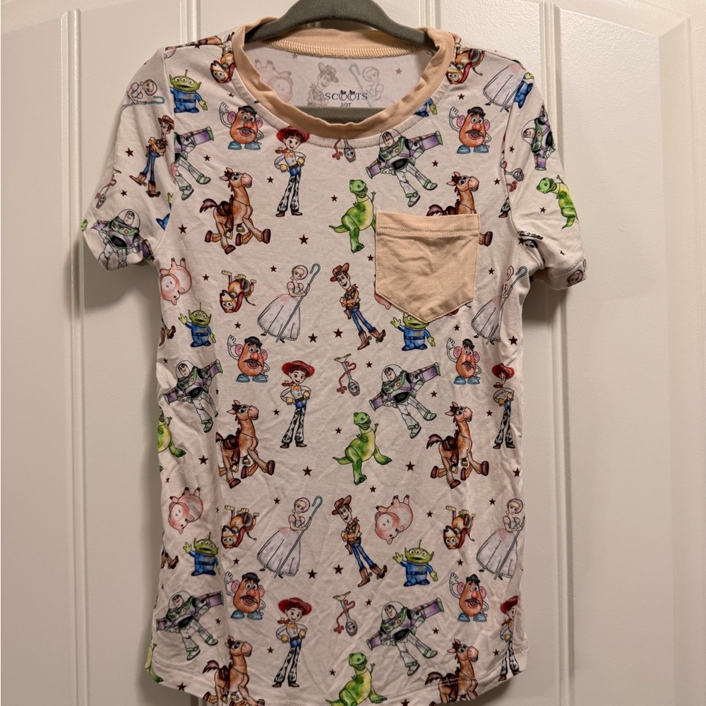 Scoots Toy Story Round Up Pocket Tee